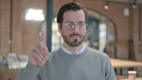 Man Shaking Head No in Close Up