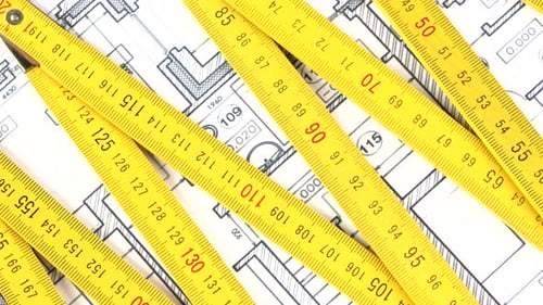 Yellow Folding Rule on Building Plan, Rotation