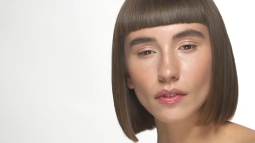 Beautiful Woman with Trendy Haircut Posing