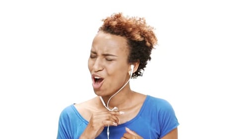 Woman Listening to Music and Singing Along