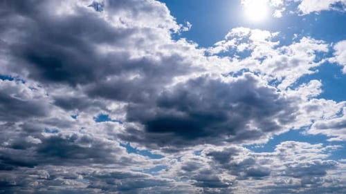 Clouds Moving Across the Blue Sky