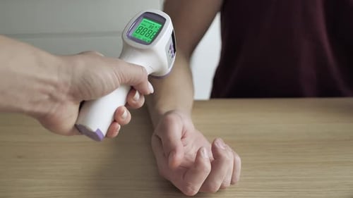 Measuring the Temperature of Mail Hand with a Noncontact Infrared Thermometer