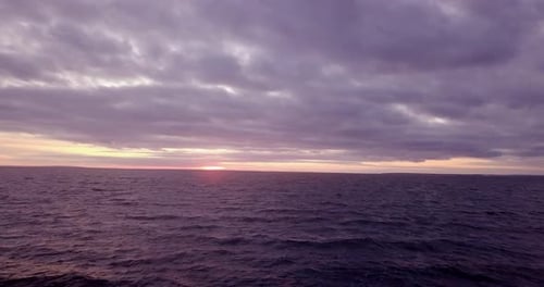 Beautiful Orange Sunset Over The Waves A Wide River From A Height Of Flight
