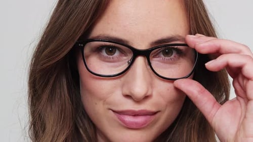 Woman Smiling Wearing Glasses in Close Up