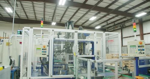 Automated Industrial Machine Operating in Factory