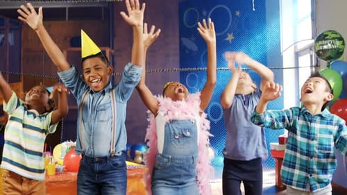 Excited Children Celebrate at Birthday Party