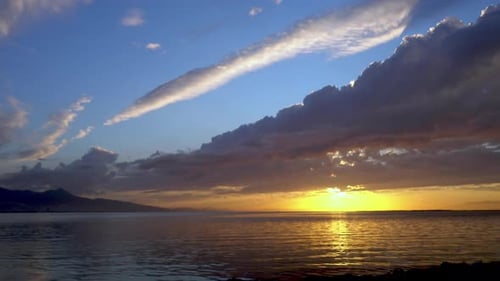 Yellow Sunset Cloudy Seascape On The Sea
