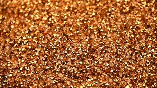 Fond abstrait de strass dorés filant