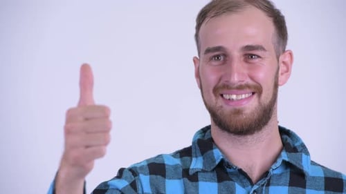 Smiling Man Gives Thumbs Up Approval