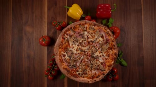 A Whole Rotating Pizza with Mushrooms