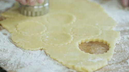 Cutting Cookie Dough with Metal Cookie Cutter