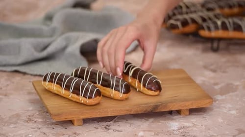 French dessert eclair with chocolate and custard. Traditional French dessert.