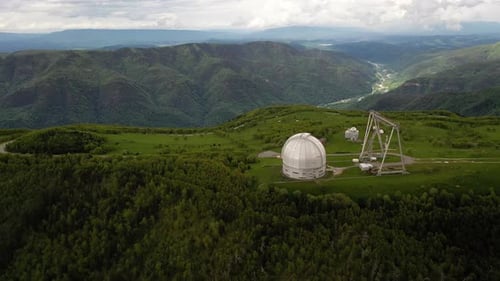 Observatory in Green Mountain Landscape Aerial View