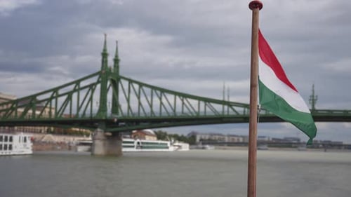 Liberty Bridge and Hungarian Flag in Budapest