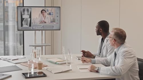 Doctors Video Conferencing in Clinic