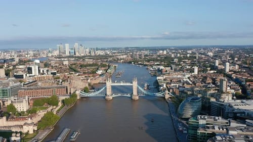Forwards Fly Above River Thames in Evening Golden Hour