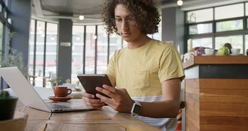 Man using digital tablet 4k