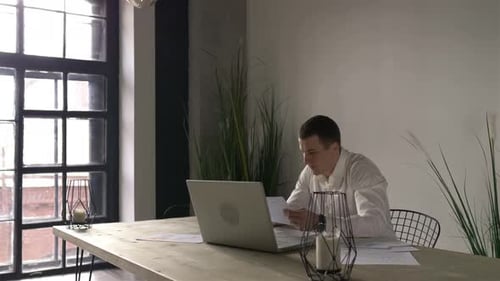 young businessman working in his office