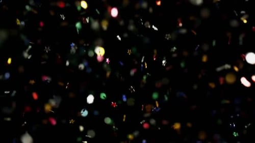 Multicolored Confetti Flying After Being Exploded Stars and Hearts Particles Flying and Falling Down