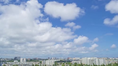Many Clouds Over the Summer City