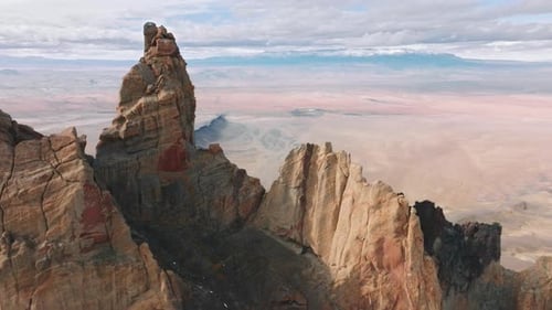 Dramatic Sharp Peaks of High Cliff Rock with Steep Walls Epic Mountain Climbing