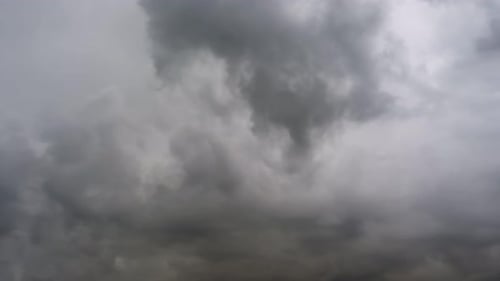 Ominous Gray Storm Clouds Zooming into View