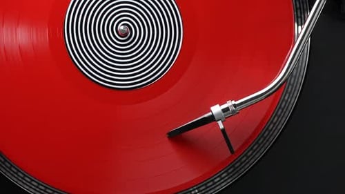 Red Vinyl Record Spinning on Turntable Close Up