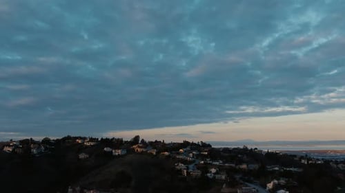 Aerial View of Hillside Homes at Sunset