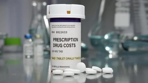 Prescription Pills and Bottle in Laboratory Setting