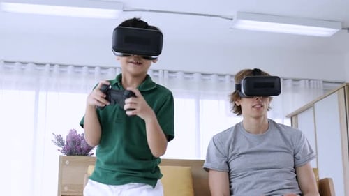 Child and Adult Playing VR Games Together