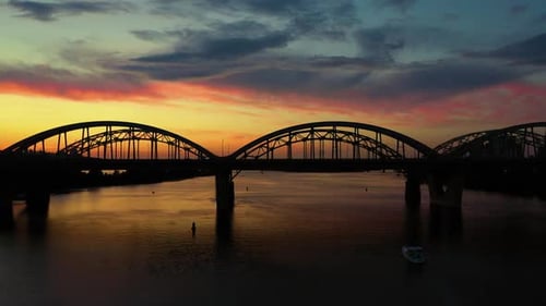 Side View of a City Bridge in the Evening