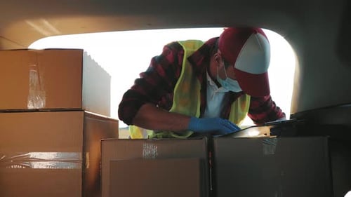 Young Delivery Man Checking List