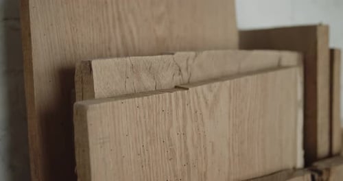 Close Up of Stacked Raw Wooden Boards