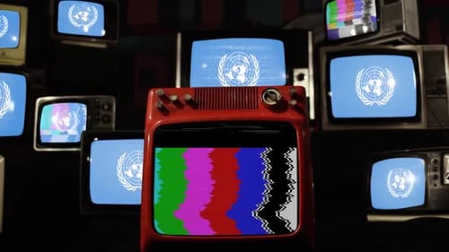 United Nations Flags on a Stack of TVs