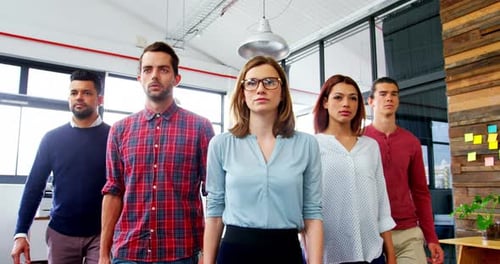 Business executives walking together in office