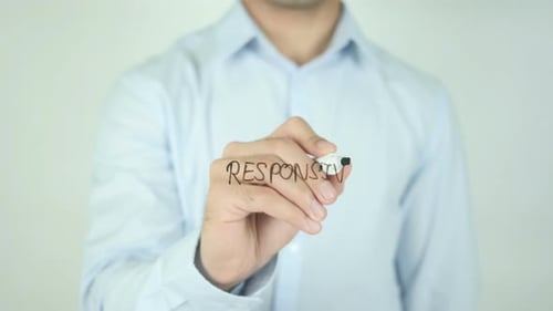Person Writing Responsive on Clear Surface Close Up