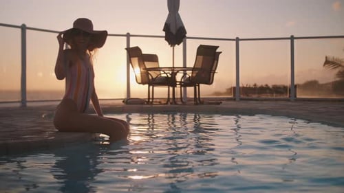 Relax At The Pool At The Sunset