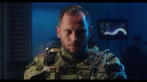 Serious Soldier in Camouflage Gear Looking Intently