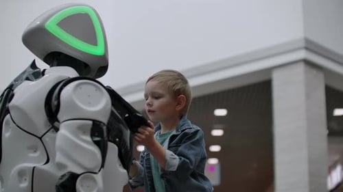 Humanoid Robot Talks with Child at Technology Exhibition
