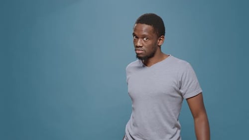 Man Threatens with a Rolling Pin in Studio