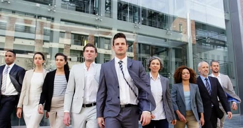 Business people walking in office building
