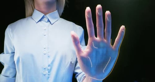 Woman Using Futuristic Digital Hand Scanning Technology