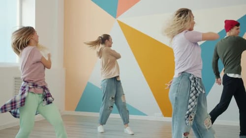 Slow Motion of Talented Young People Training in Modern Dance Studio Enjoying Lesson