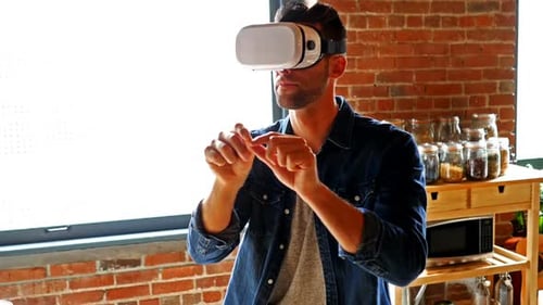 Man Using Virtual Reality Headset Indoors