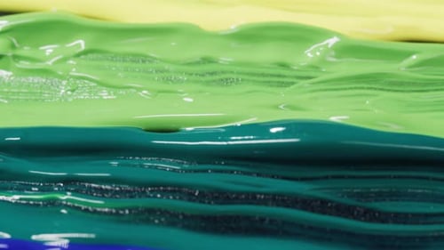 Lines of colorful glossy paint close up