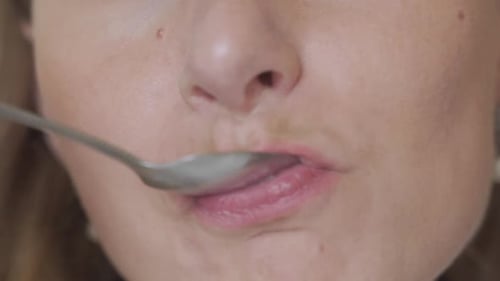 Woman Eating Sweet Dessert Close Up