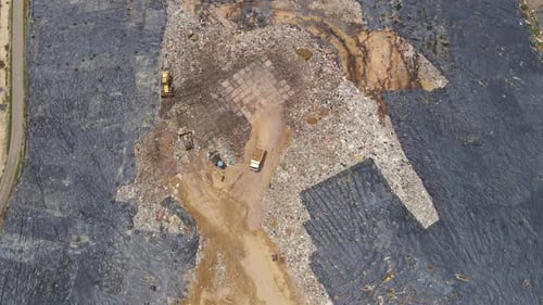 Aerial Top View Video of a Solid Waste Landfill. City Waste Treatment Location. Environmental