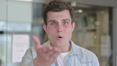 Young Man Gesturing Shock, Surprise