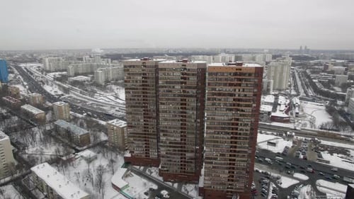 Winter Cityscape With Snow Covered Buildings Aerial View