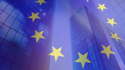 Drapeau de l'UE avec des immeubles de bureaux modernes en arrière-plan
